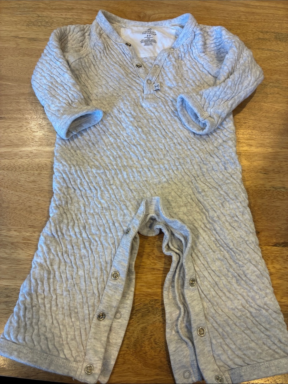 The Honest Company Light Gray Textured Baby Footie Romper